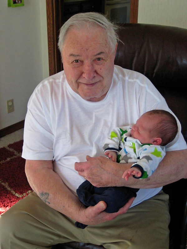 Grandpa (Marvin) holding his great-grandson (Theodore Marvin)